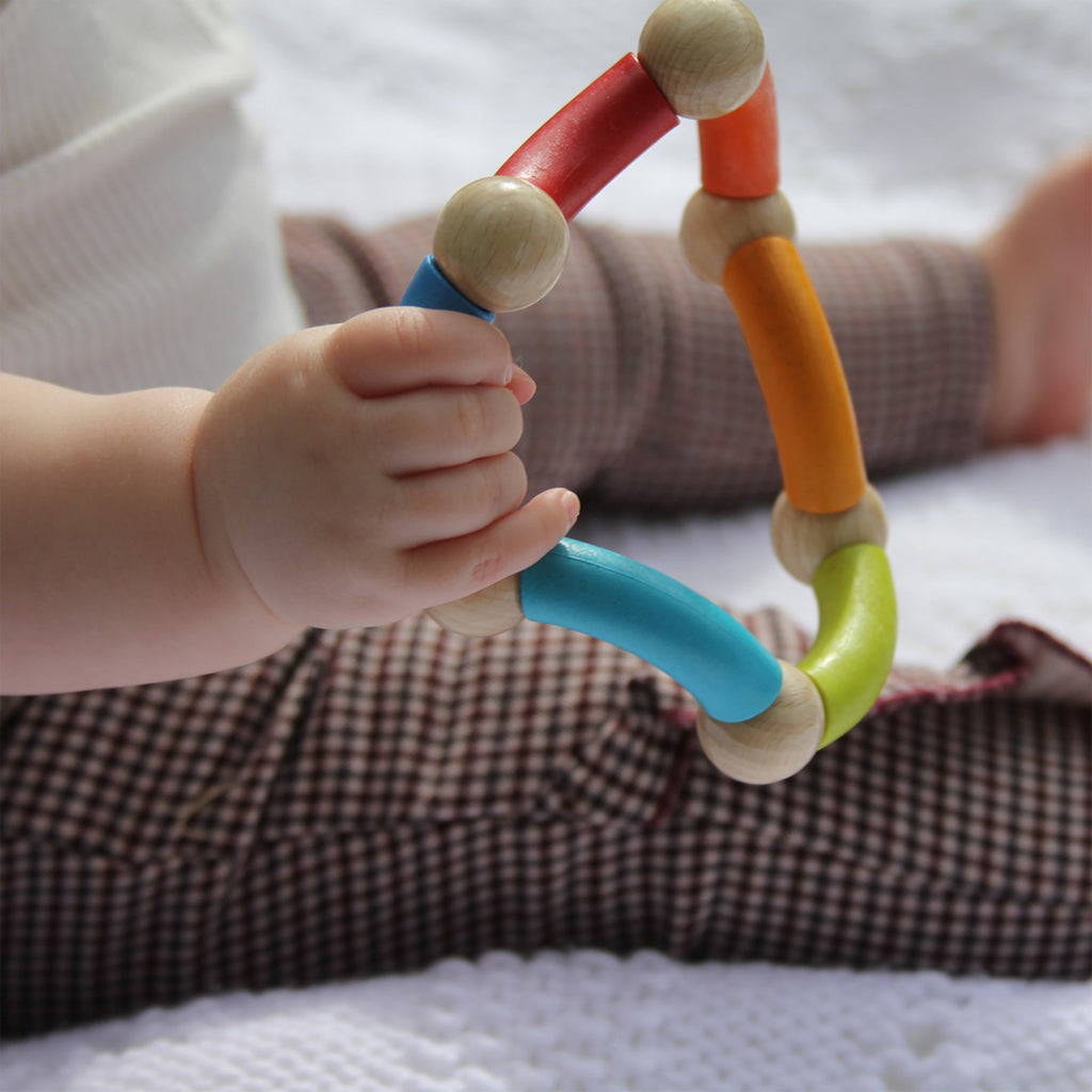 Daily Care Color Snake Wooden Rattle and Fidget Toy - sustainably sourced wood for daily home and personal routines with baby care and kids products